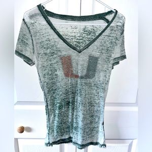 Miami shirt used in great condition size woman's small.